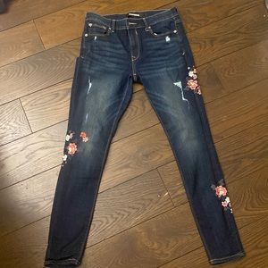 Mid rise, dark wash jeans